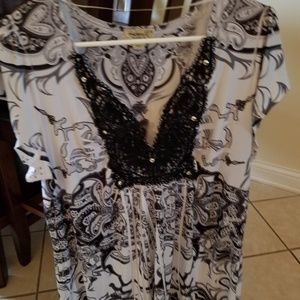 White and black top with black trim.